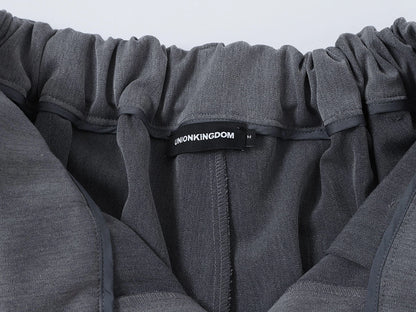 LOOSE FIT PLEATED 'GRAY' SHORTS