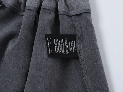 LOOSE FIT PLEATED 'GRAY' SHORTS