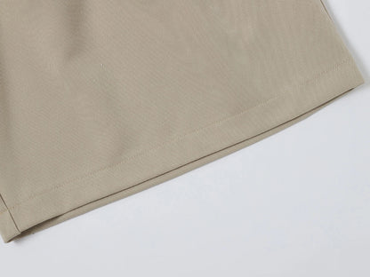 LOOSE FIT PLEATED 'SAND' SHORTS