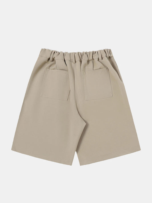 LOOSE FIT PLEATED 'SAND' SHORTS