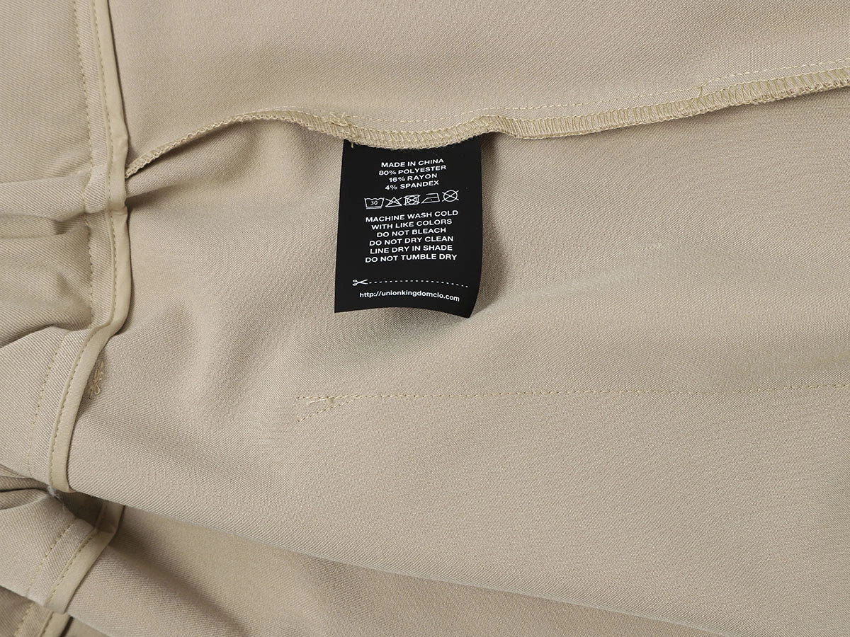 LOOSE FIT PLEATED 'SAND' SHORTS