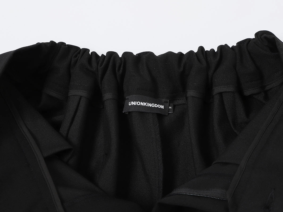 LOOSE FIT PLEATED 'BLACK' SHORTS