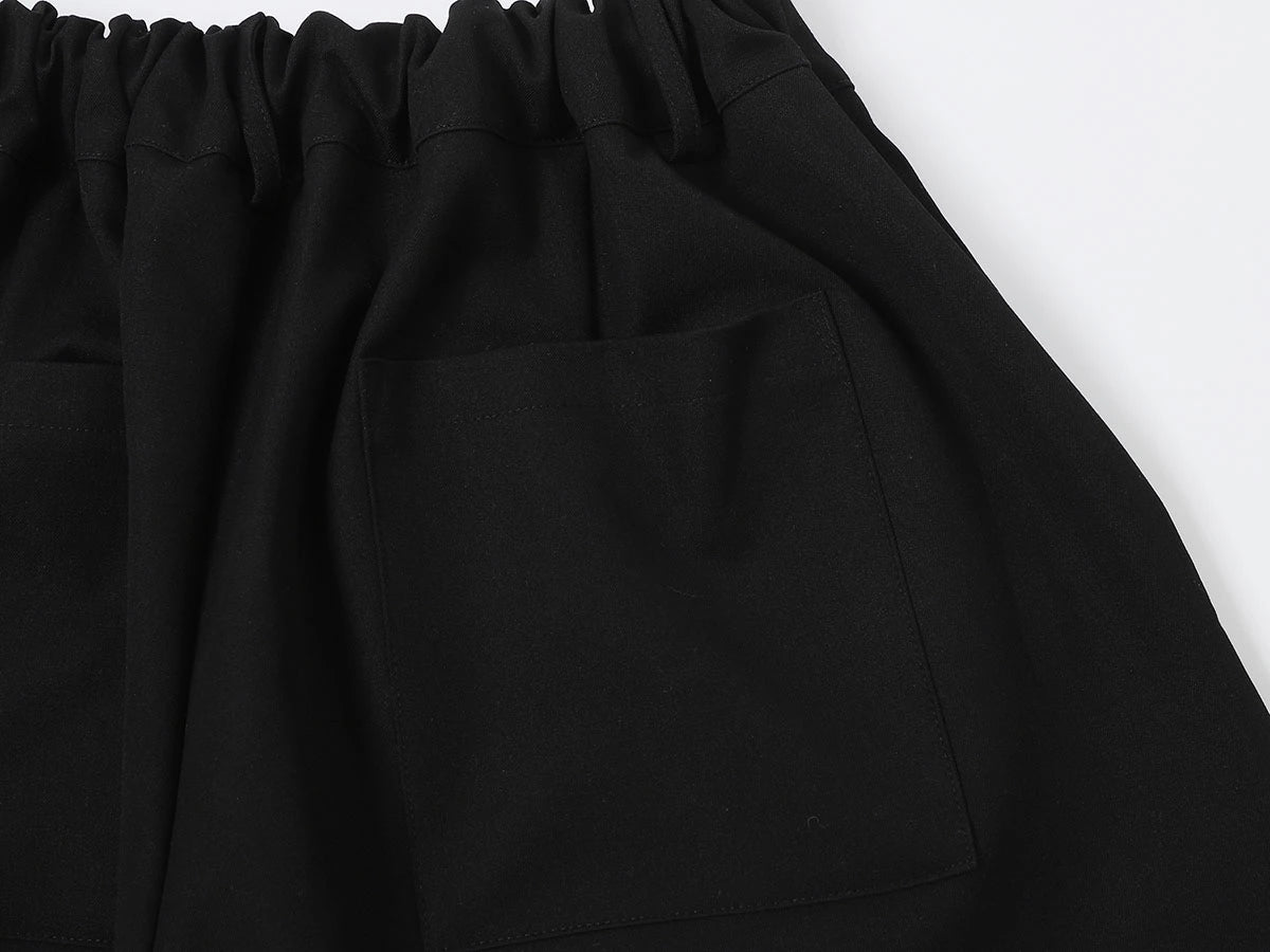 LOOSE FIT PLEATED 'BLACK' SHORTS