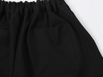 LOOSE FIT PLEATED 'BLACK' SHORTS